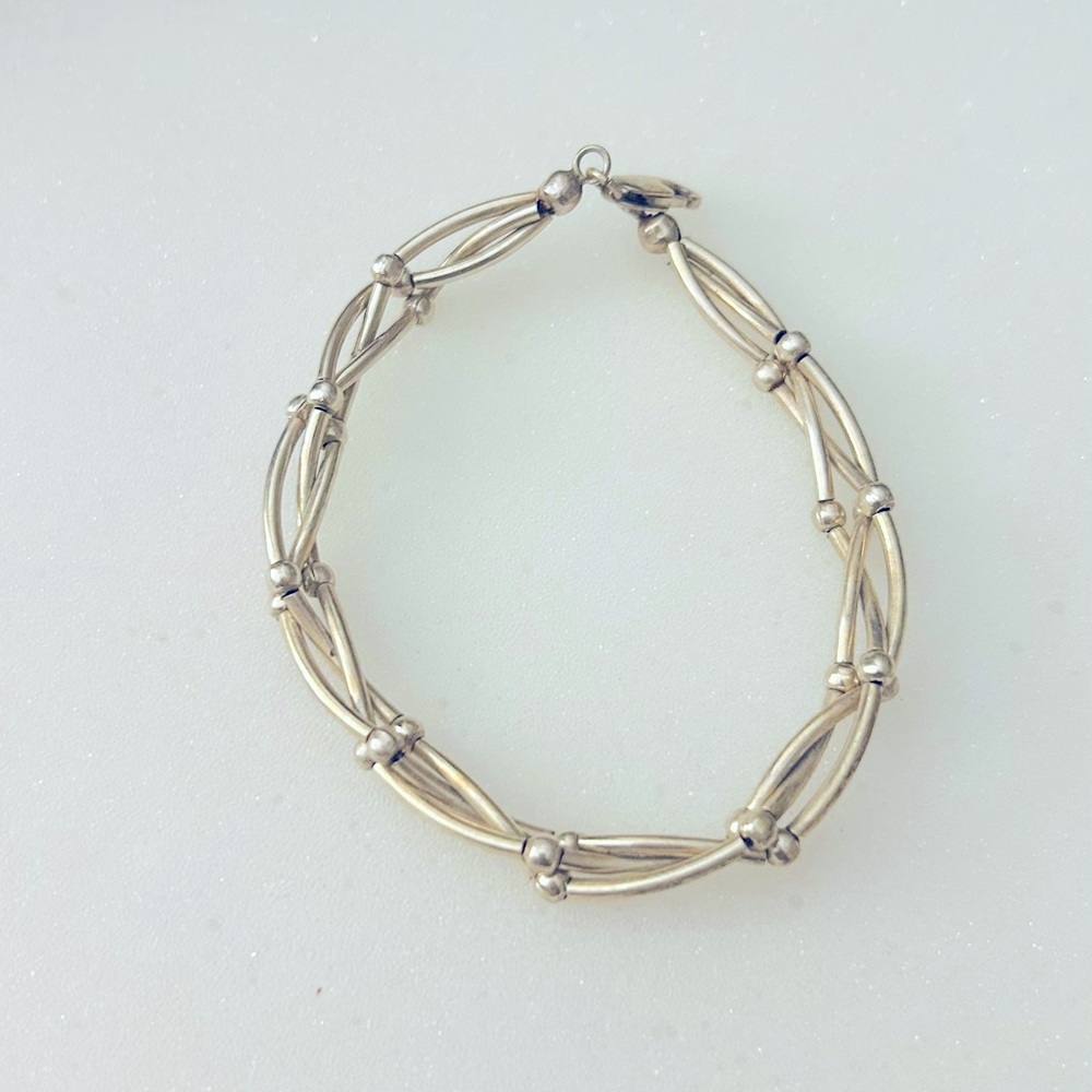 Silver bracelet.